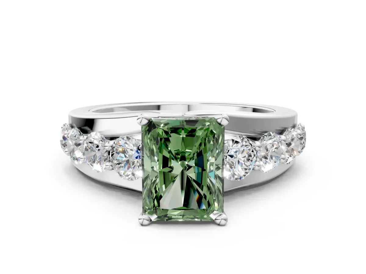 Fancy Green Radiant Cut Brilliant Solitaire with Side Stones on a Pave Band and Four-Prong Setting Platinum