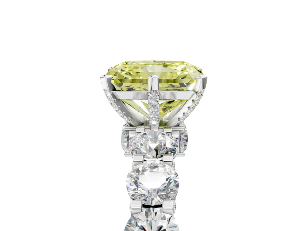 Fancy Yellow Radiant Cut Diamond Side Stone Engagement Ring with Four-Prong Setting Platinum