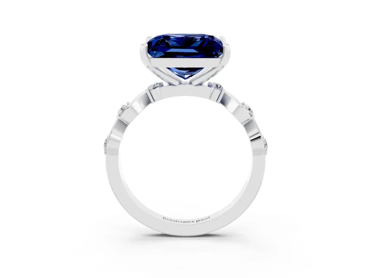 Princess Cut Blue Sapphire Solitaire Twisted Band with Round Accents and Prong Setting White gold