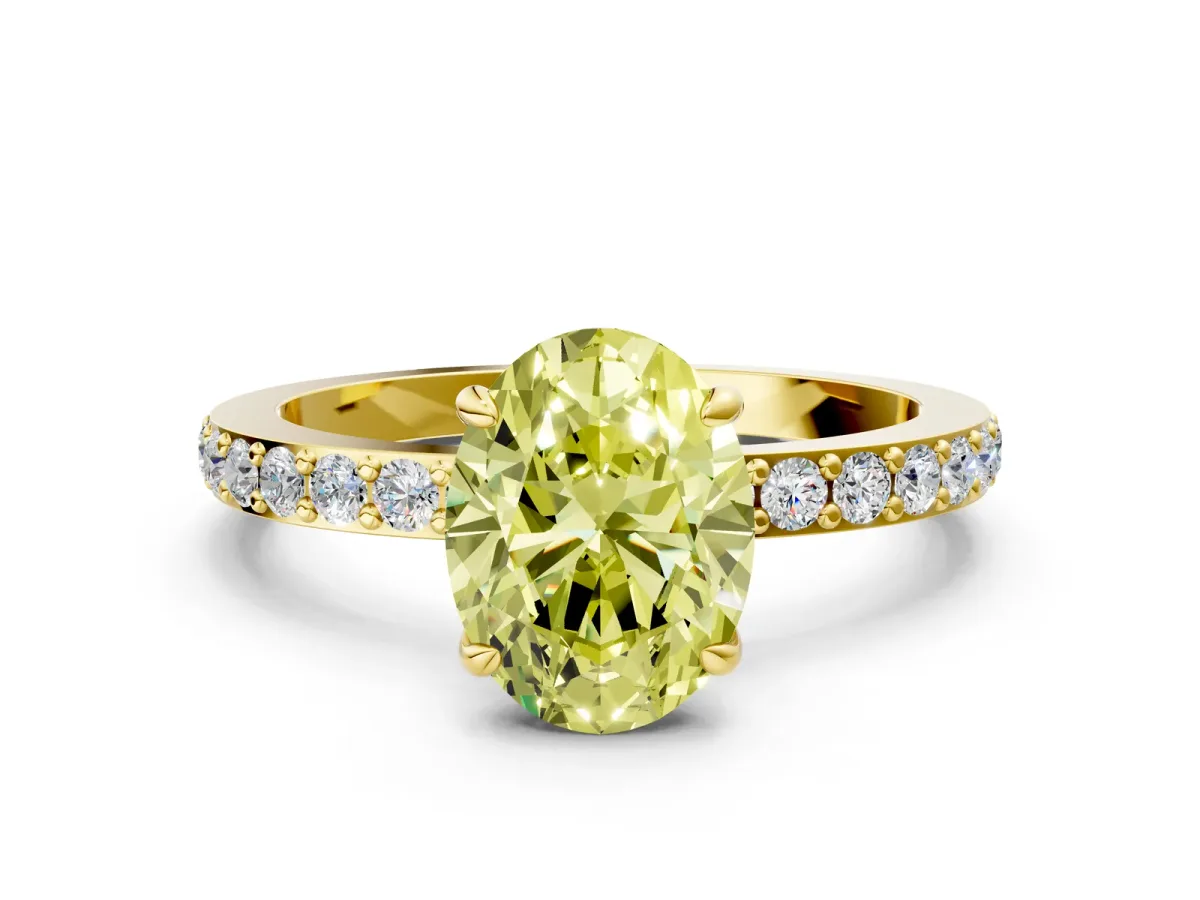 Fancy Yellow Oval Cut Diamond Solitaire Engagement Ring with Pavé Band and Four-Prong Setting Yellow gold