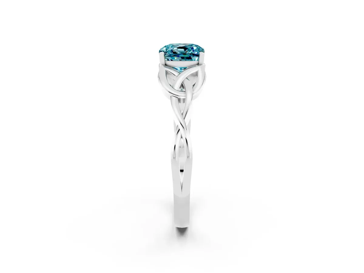 Cushion Cut Blue Topaz Solitaire Engagement Ring with Celtic Knot Band and Four-Prong Setting White gold