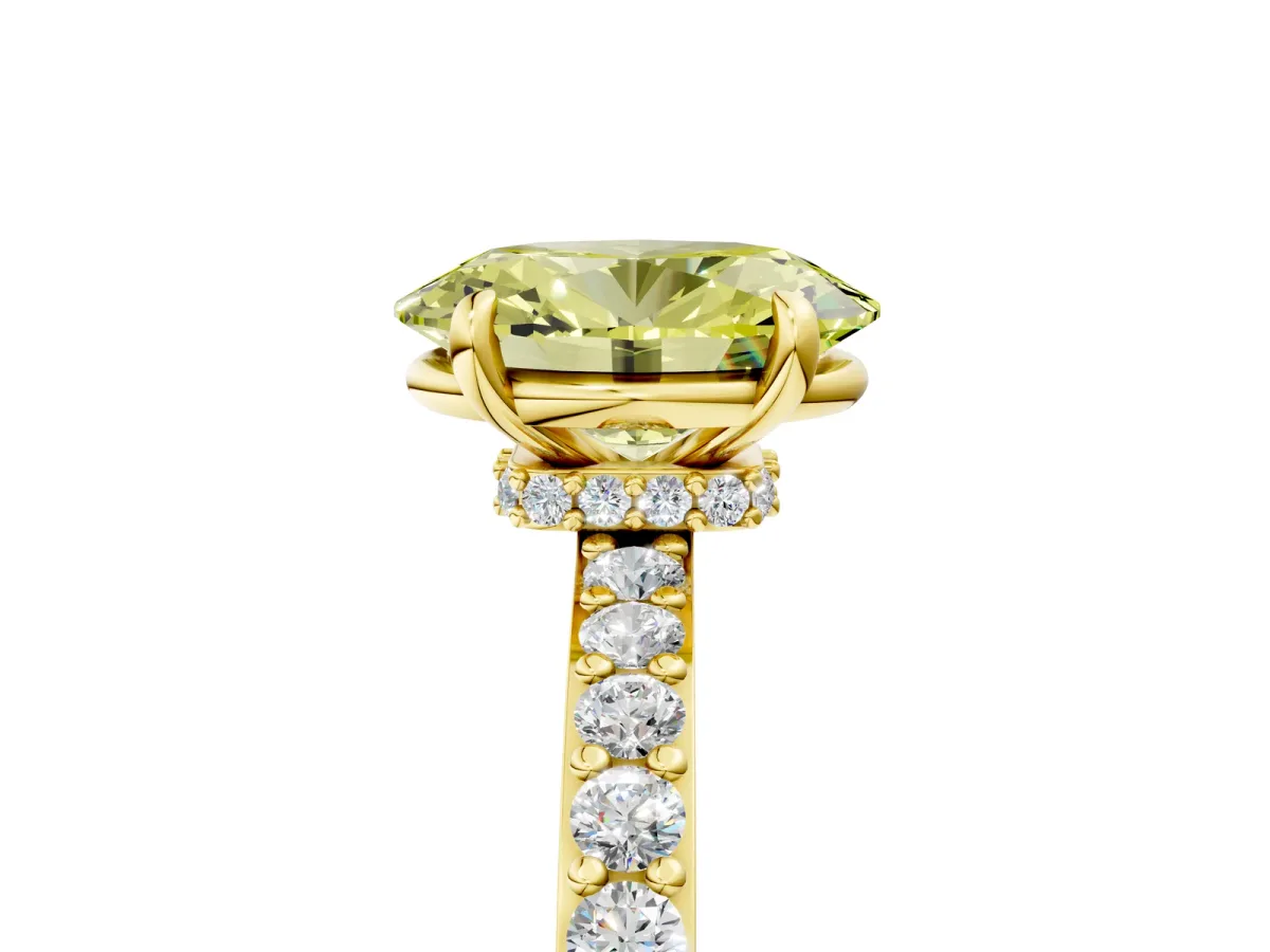 Fancy Yellow Oval Cut Diamond Solitaire Engagement Ring with Pavé Band and Four-Prong Setting Yellow gold