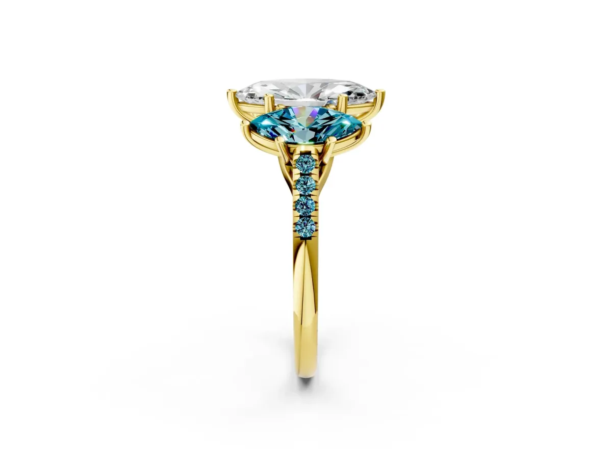 Three-Stone Marquise Cut Diamond Ring with Round Blue Topaz Pavé Band and Prong Setting Yellow gold