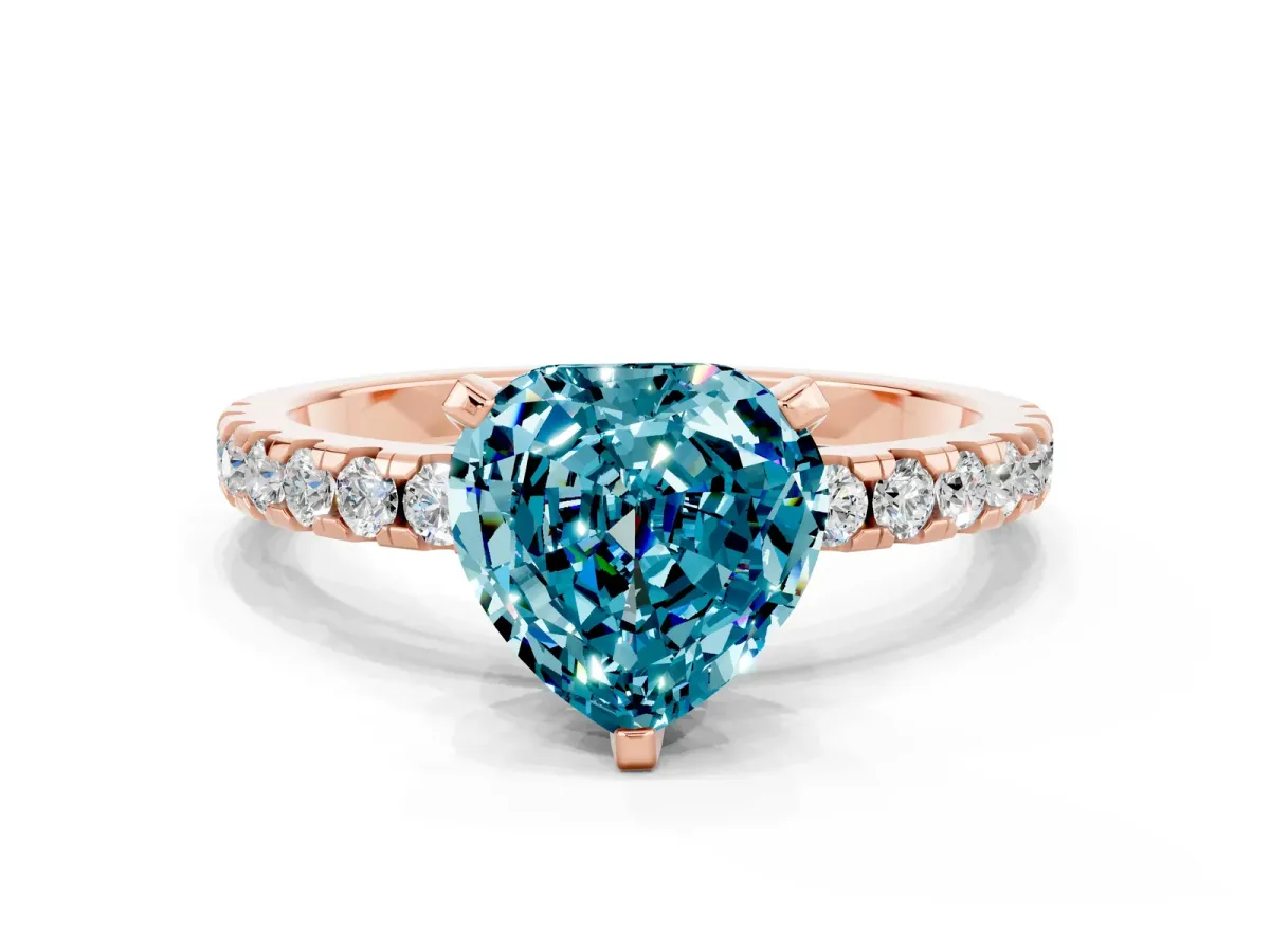 Heart Cut Blue Topaz Solitaire Ring with Round Pavé Band and Four-Prong Setting Rose gold