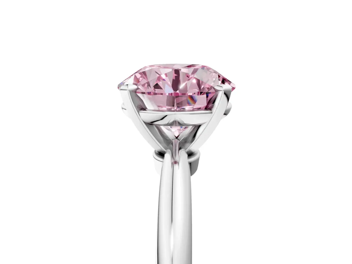 Fancy Pink Round Cut Diamond Solitaire Ring with Six-Prong Setting and Classic Band Silver