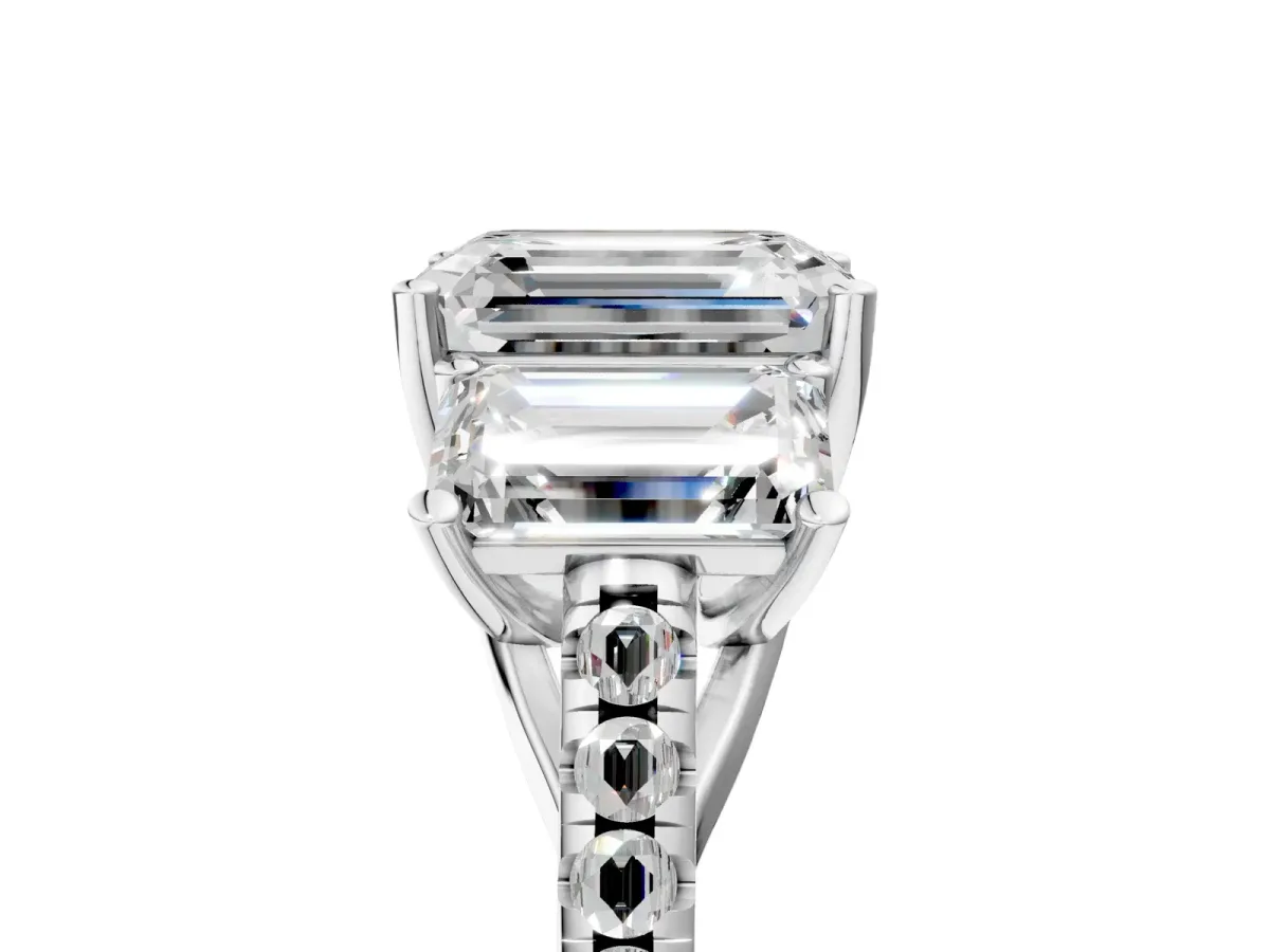 Three-Stone Emerald Cut Diamond Ring with Round Pavé Band and Prong Setting White gold