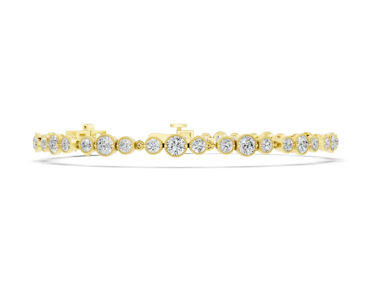 Round Bezel-Set Diamond Tennis Bracelet with Milgrain Detailing Yellow gold