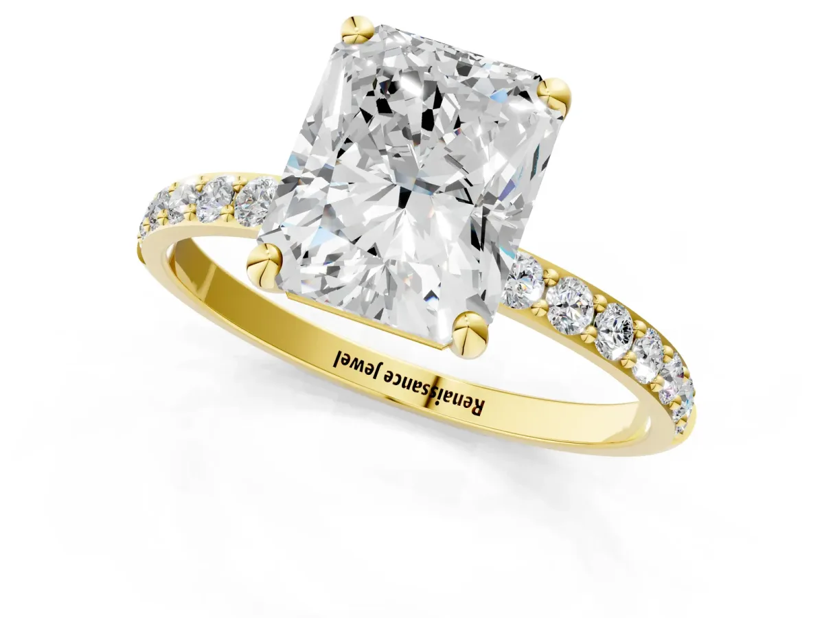 Radiant Cut Diamond Solitaire Ring with Round Moissanite Pavé Band and Prong Setting Yellow gold