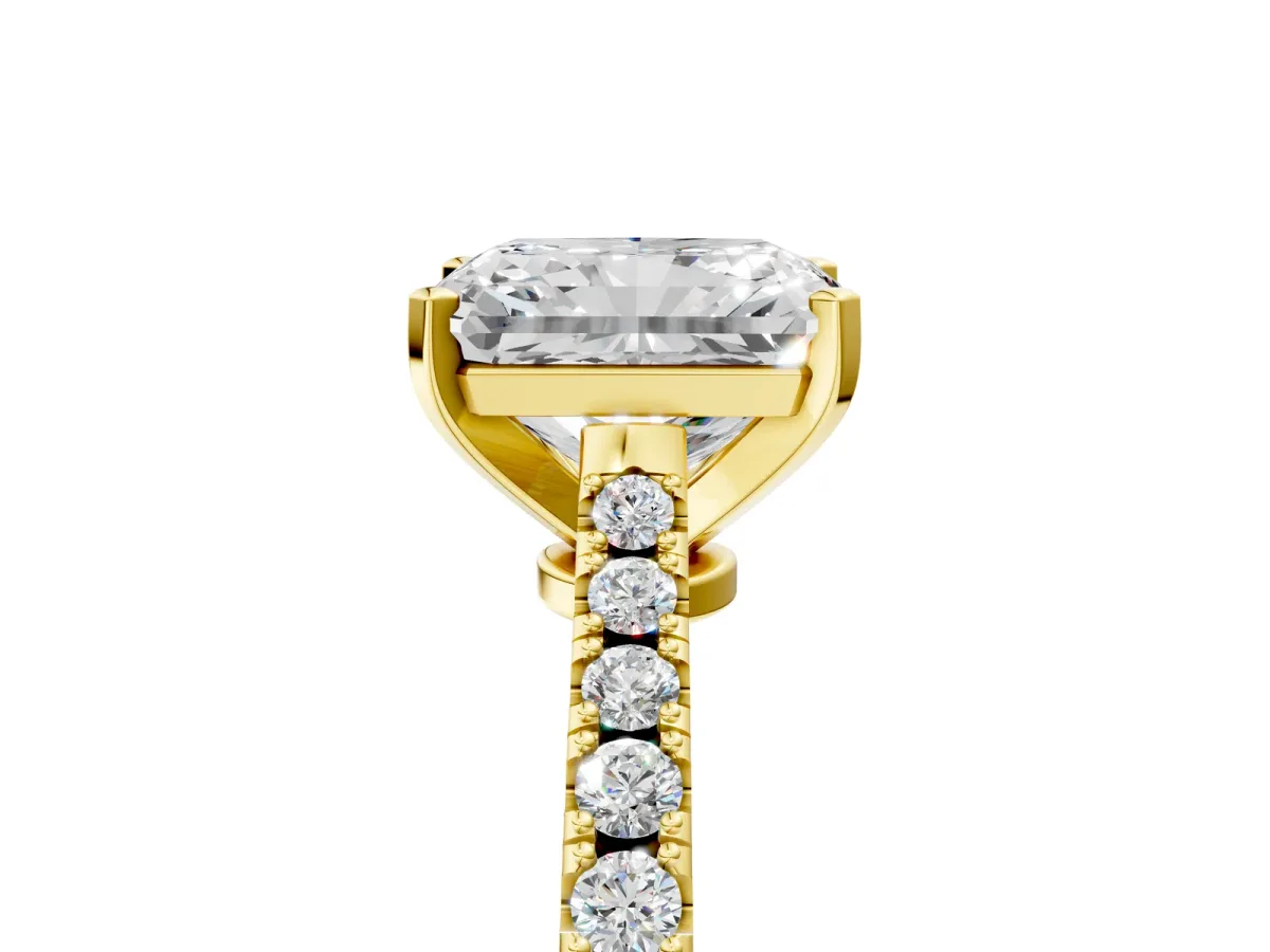 Radiant Cut Cut Solitaire Diamond Engagement Ring with Pave Band and Four-Prong Setting Yellow gold