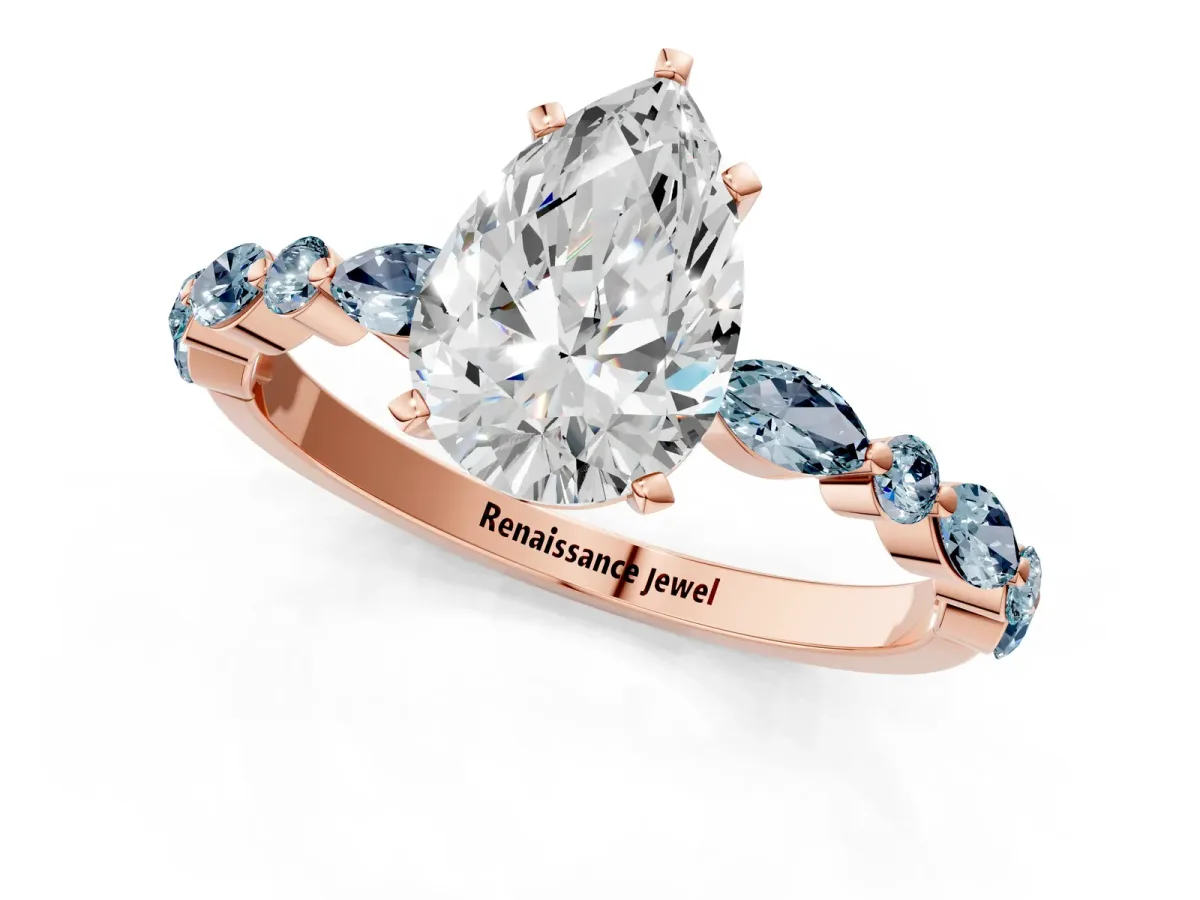 Pear Cut Diamond Ring with Marquise and Round Aquamarine Side Stones and Four-Prong Setting Rose gold