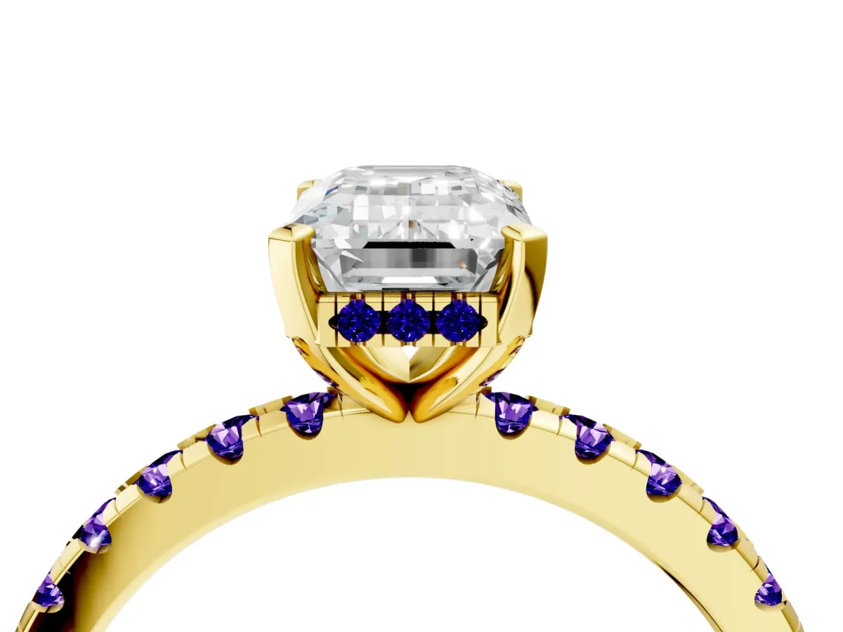 Emerald Cut Diamond Solitaire Ring with Round Tanzanite Pavé Band and Four-Prong Setting Yellow gold