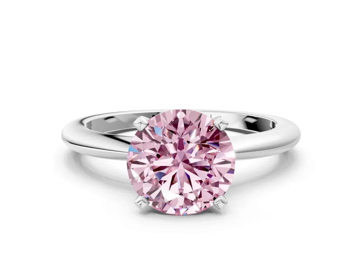 Fancy Pink Round Cut Diamond Solitaire Ring with Six-Prong Setting and Classic Band Silver