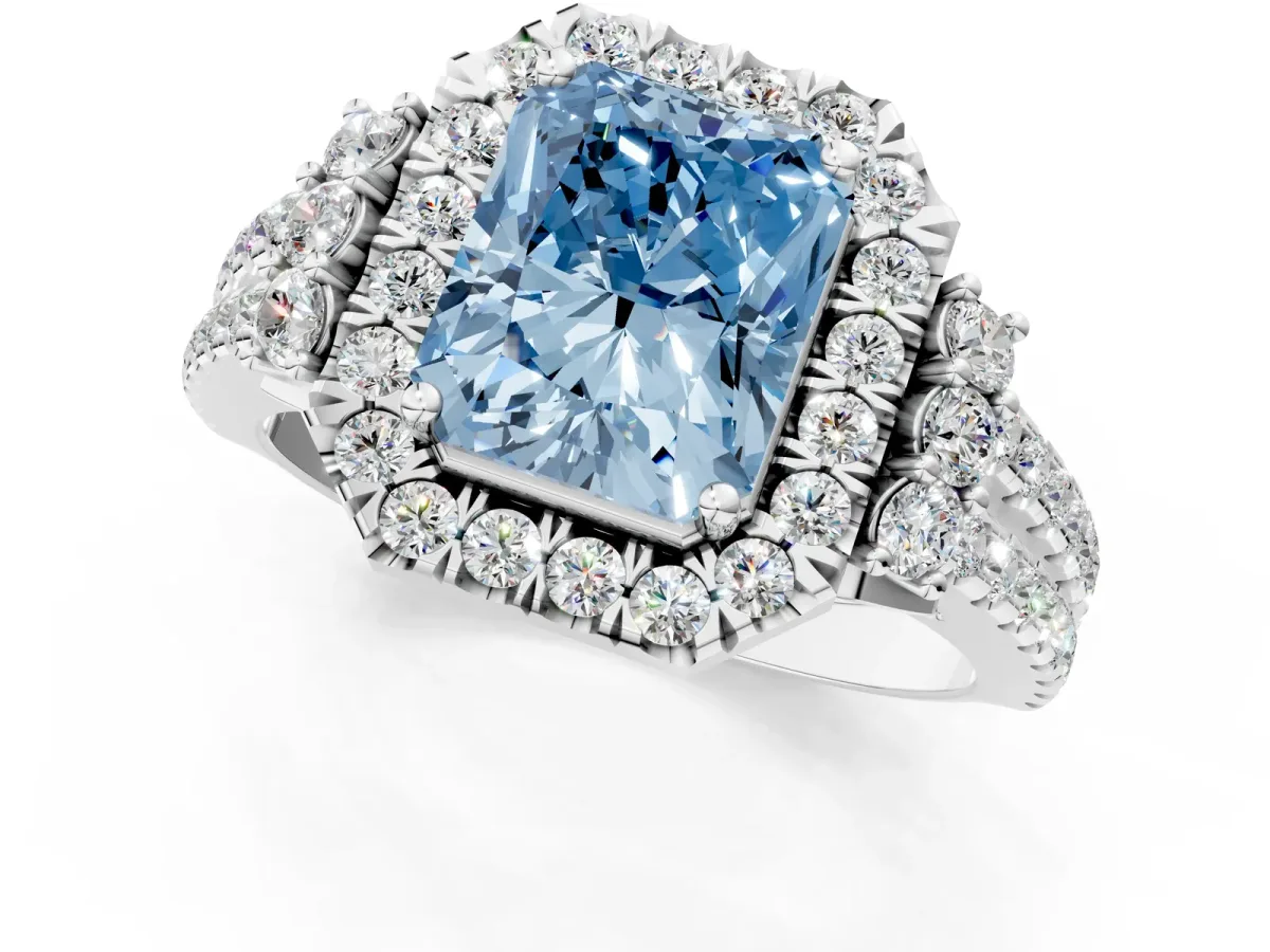 Fancy Blue Radiant Cut Cut Double Halo Diamond Engagement Ring with Pave Band and Four-Prong Setting Platinum