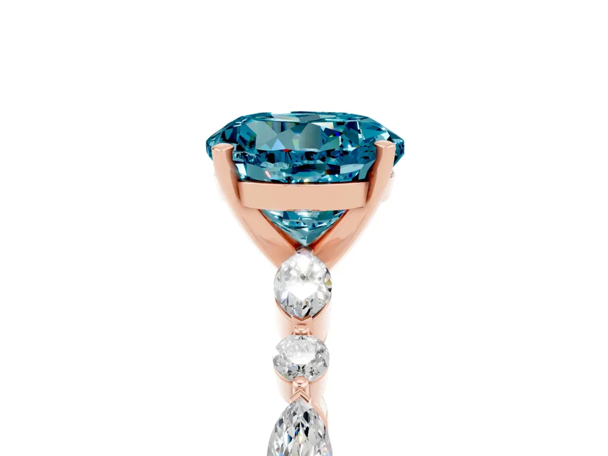 Round Cut Blue Topaz Ring with Marquise and Round Side Stones and Four-Prong Setting Rose gold