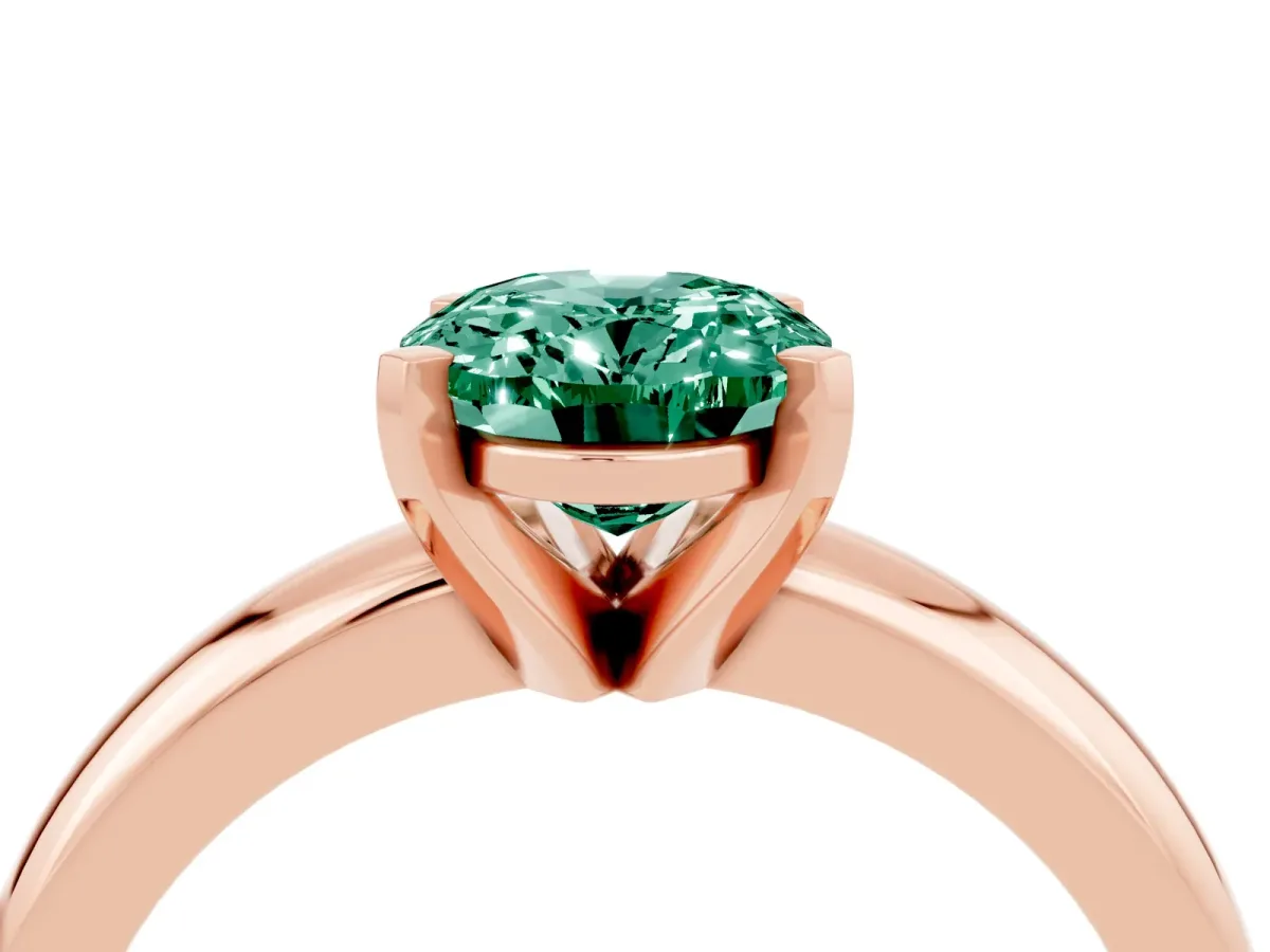 Oval Cut Green Sapphire Solitaire Engagement Ring with Round Band and Four-Prong Setting Rose gold
