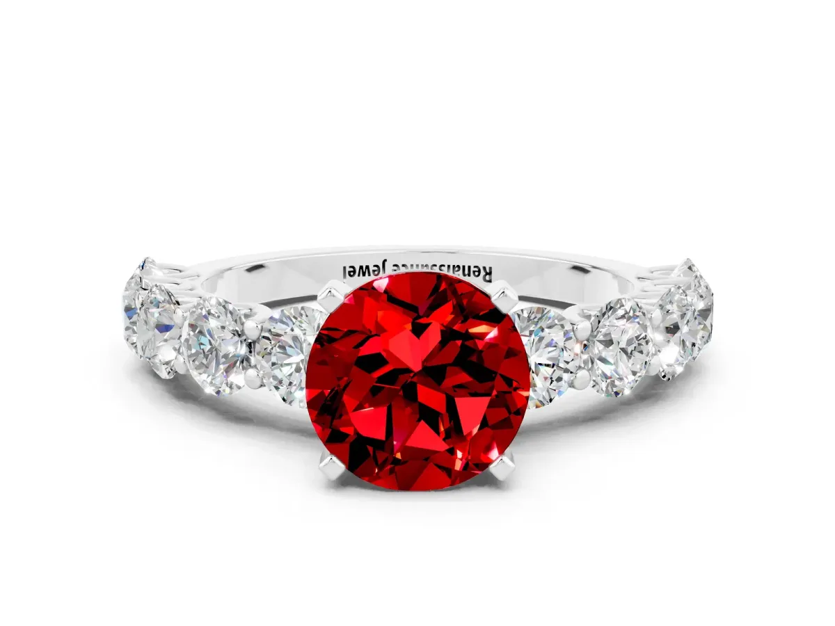 Round Cut Ruby Prong Setting with Side Stones on a Pave Band White gold