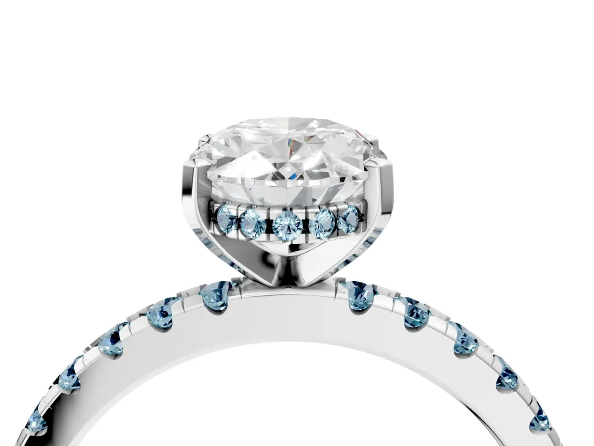 Oval Cut Diamond Solitaire Ring with Round Aquamarine Pavé Band and Four-Prong Setting White gold