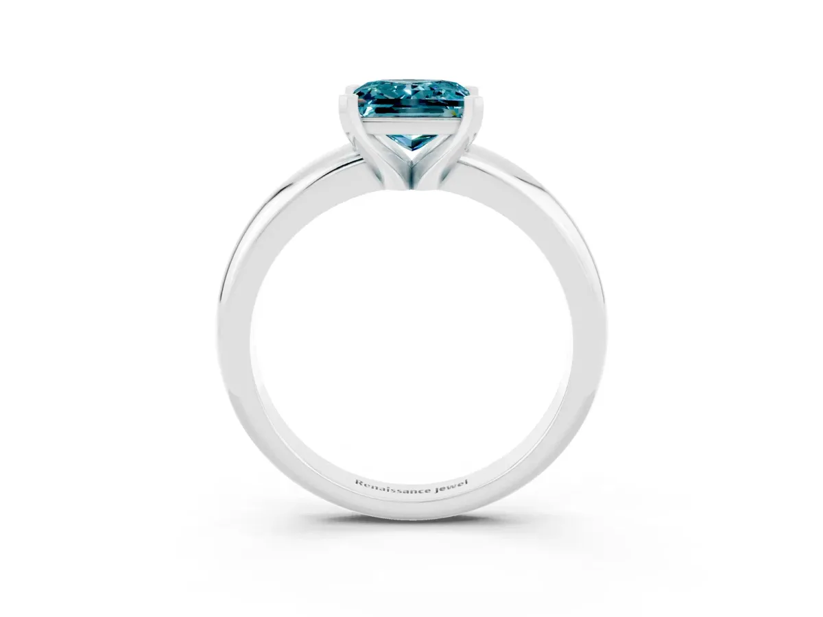 Princess Cut Blue Topaz Solitaire Engagement Ring with Round Band and Four-Prong Setting White gold