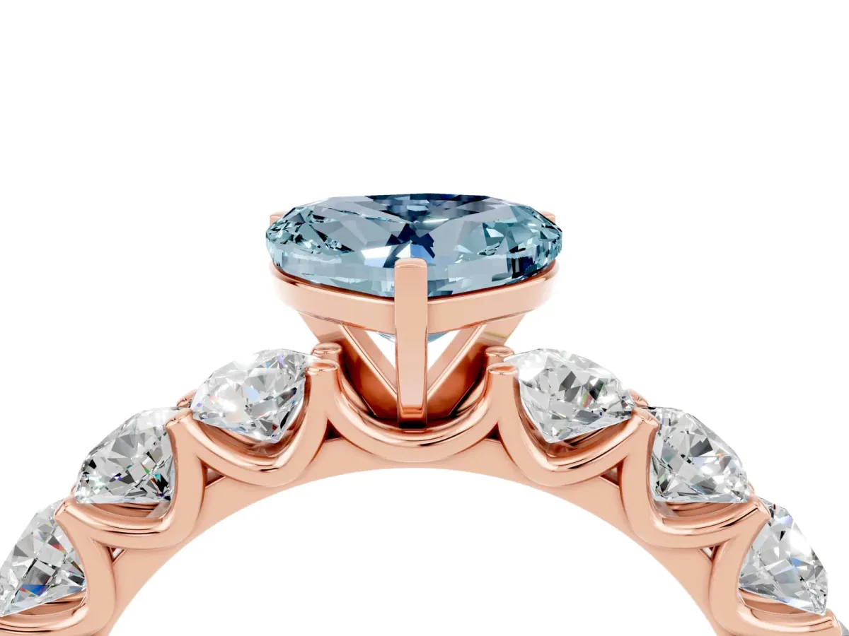 Heart Cut Aquamarine Prong Setting with Side Stones on a Pave Band Rose gold