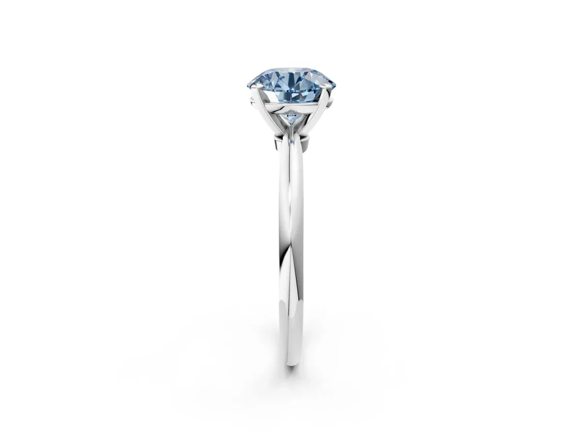 Fancy Blue Round Cut Diamond Solitaire Ring with Six-Prong Setting and Classic Band Platinum