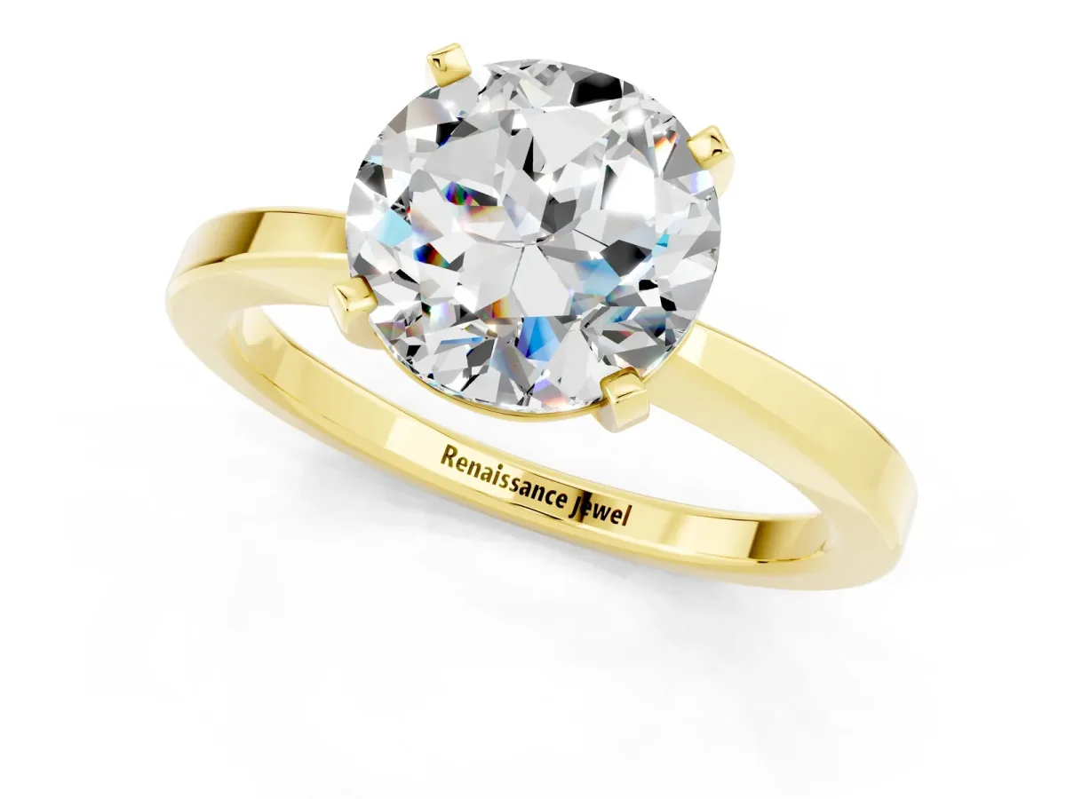 Round Cut Moissanite Solitaire Engagement Ring with Classic Band and Four-Prong Setting Yellow gold