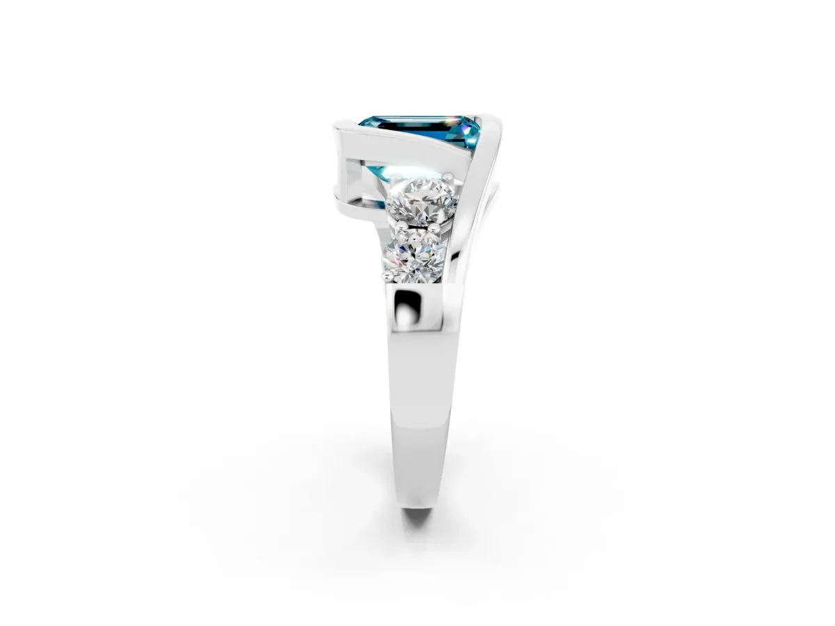 Bezel Set Emerald Cut Blue Topaz Bypass Ring with Round Accents Silver