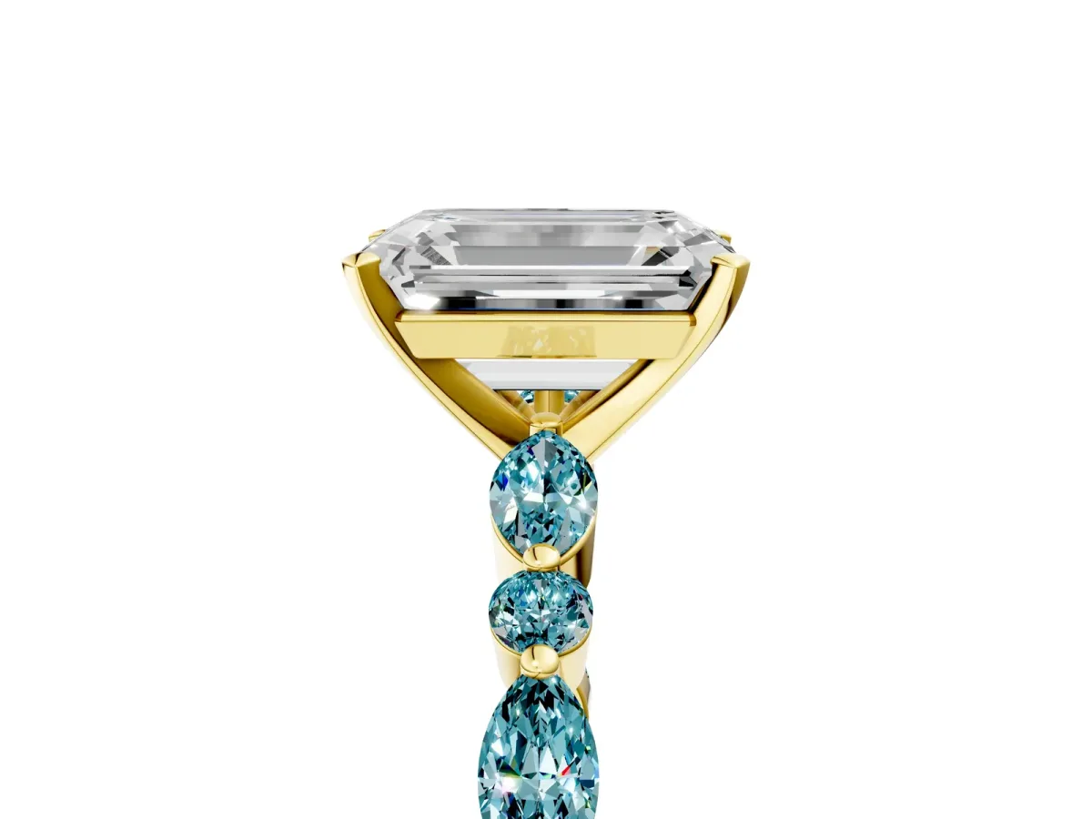 Emerald Cut Diamond Ring with Marquise and Round Blue Topaz Side Stones and Four-Prong Setting Yellow gold