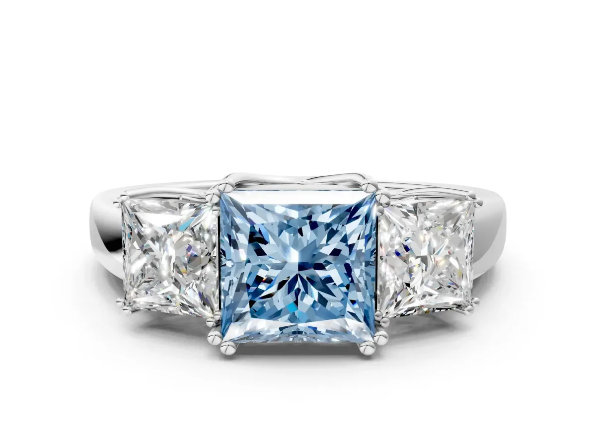 Fancy Blue Three-Stone Princess Cut Cut Diamond Ring with Channel Set Band and Four-Prong Setting Silver