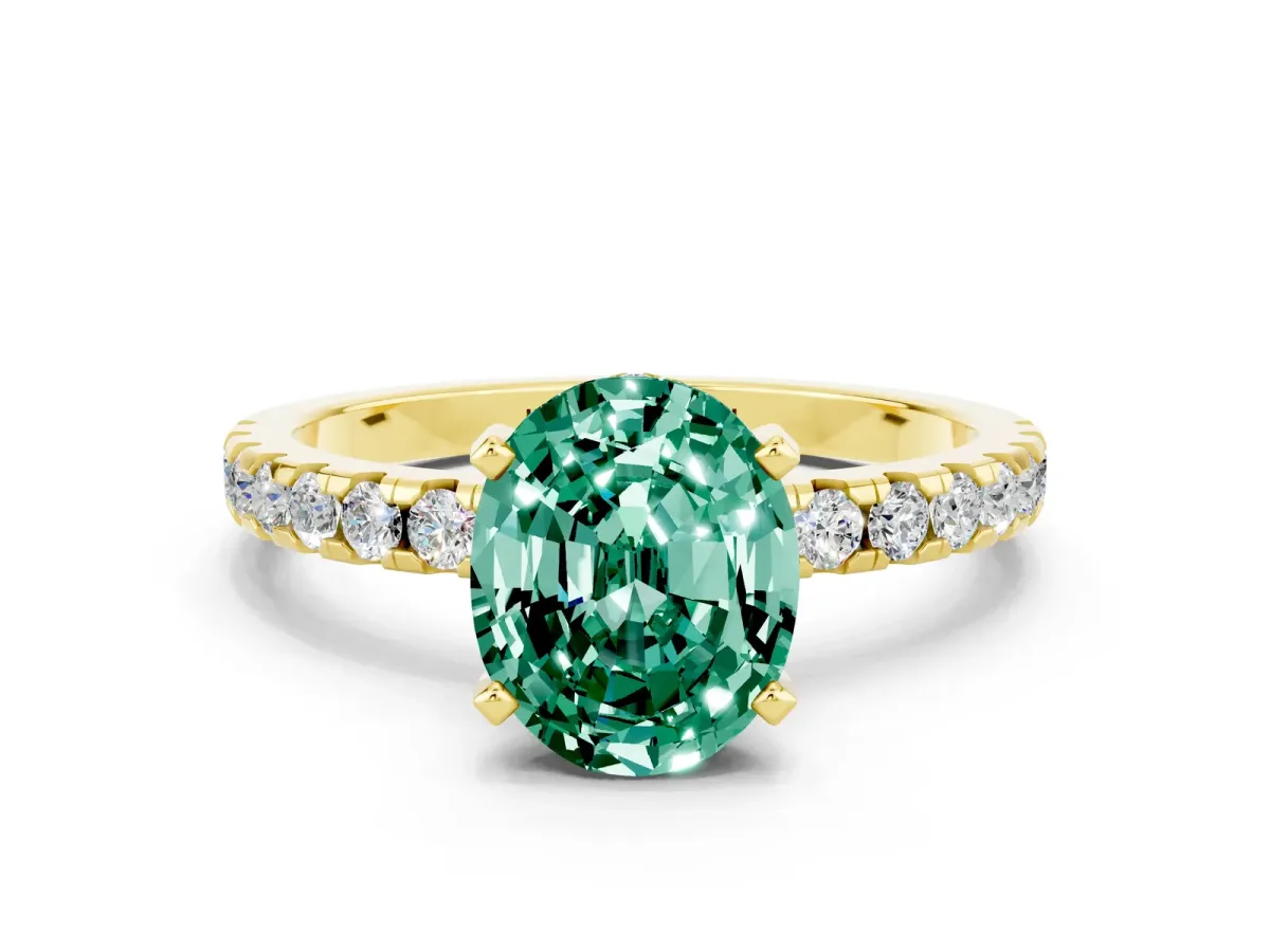 Oval Cut Green Sapphire Solitaire Ring with Round Pavé Band and Four-Prong Setting Yellow gold