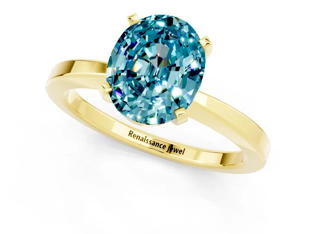 Oval Cut Blue Topaz Solitaire Engagement Ring with Classic Band and Four-Prong Setting Yellow gold
