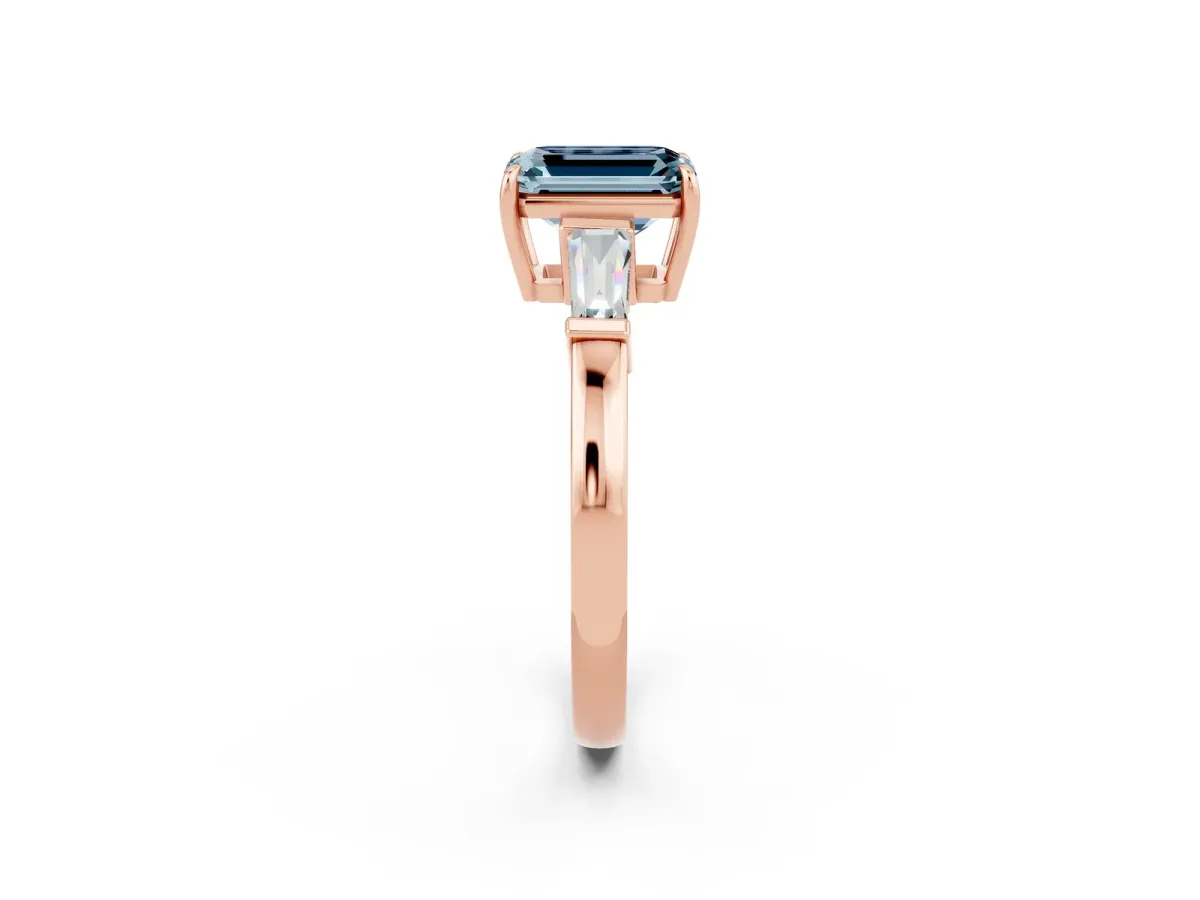 Emerald Cut Aquamarine Three-Stone Ring with Tapered Baguette Side Stones and Prong Setting Rose gold
