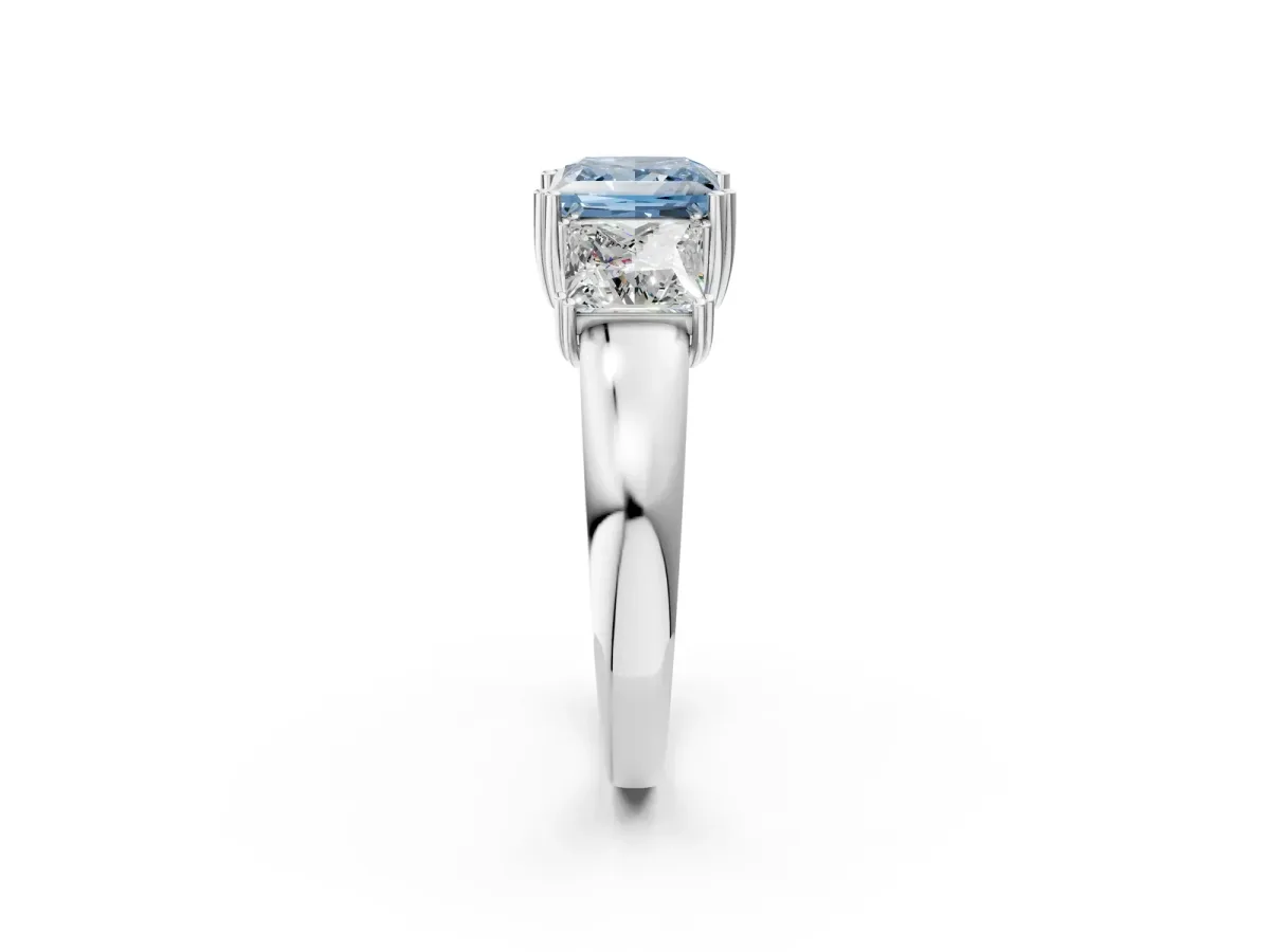 Fancy Blue Three-Stone Princess Cut Cut Diamond Ring with Channel Set Band and Four-Prong Setting Silver