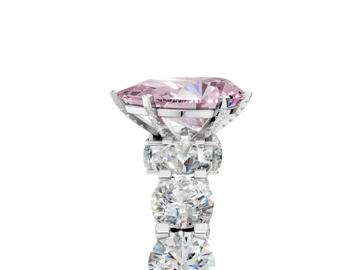 Fancy Pink Pear Cut Diamond Side Stone Engagement Ring with Four-Prong Setting Platinum