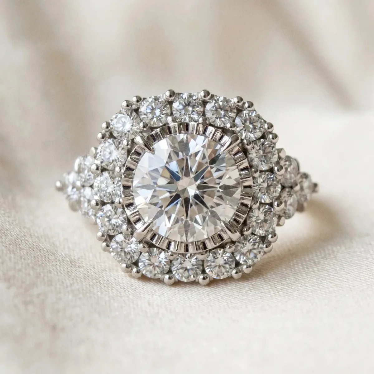 Round Cut Diamond Halo Ring with Pavé Band and Four-Prong Setting Silver