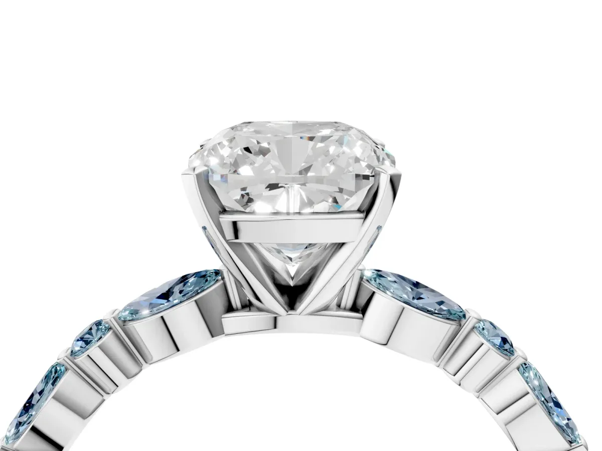 Cushion Cut Diamond Ring with Marquise and Round Aquamarine Side Stones and Four-Prong Setting Platinum