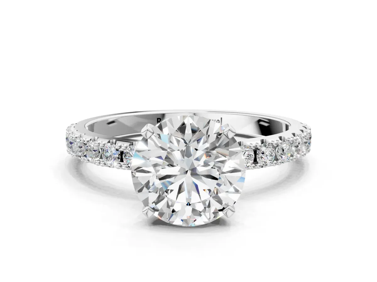 Round Cut Diamond Solitaire Pavé Band with Four-Prong Setting Silver