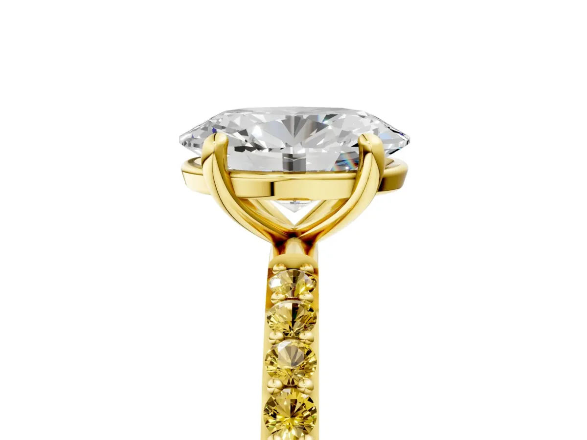 Oval Cut Diamond Solitaire Ring with Round Yellow Sapphire Pavé Band and Prong Setting Yellow gold