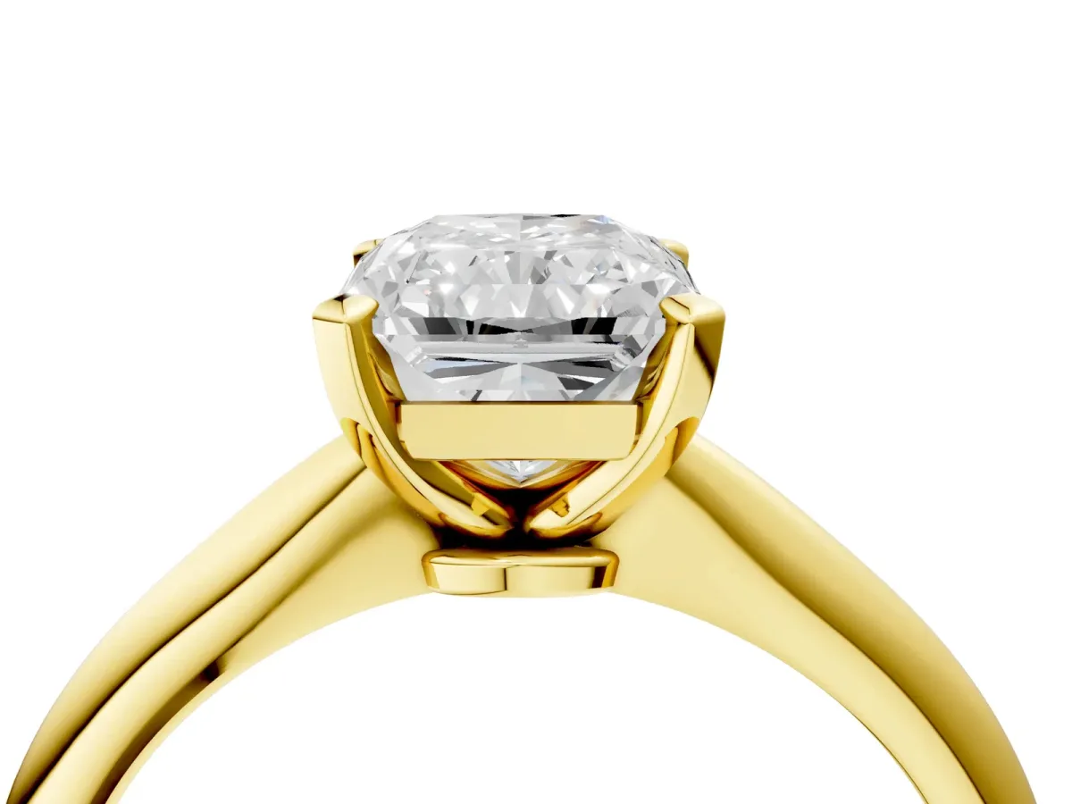 Radiant Cut Diamond Solitaire Engagement Ring with Classic Band and Four-Prong Setting Yellow gold