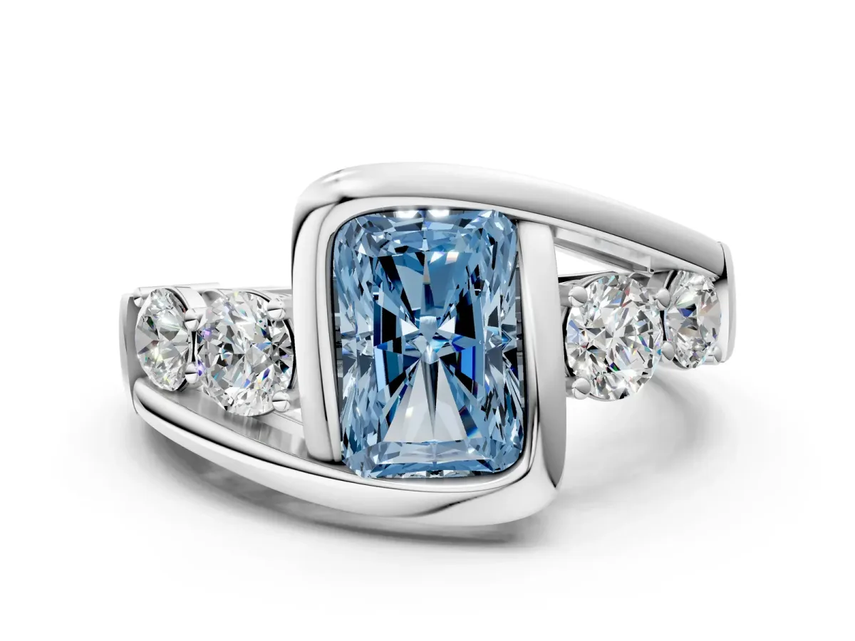 Fancy Blue Bezel Set Radiant Cut Diamond Bypass Ring with Round Accents Platinum