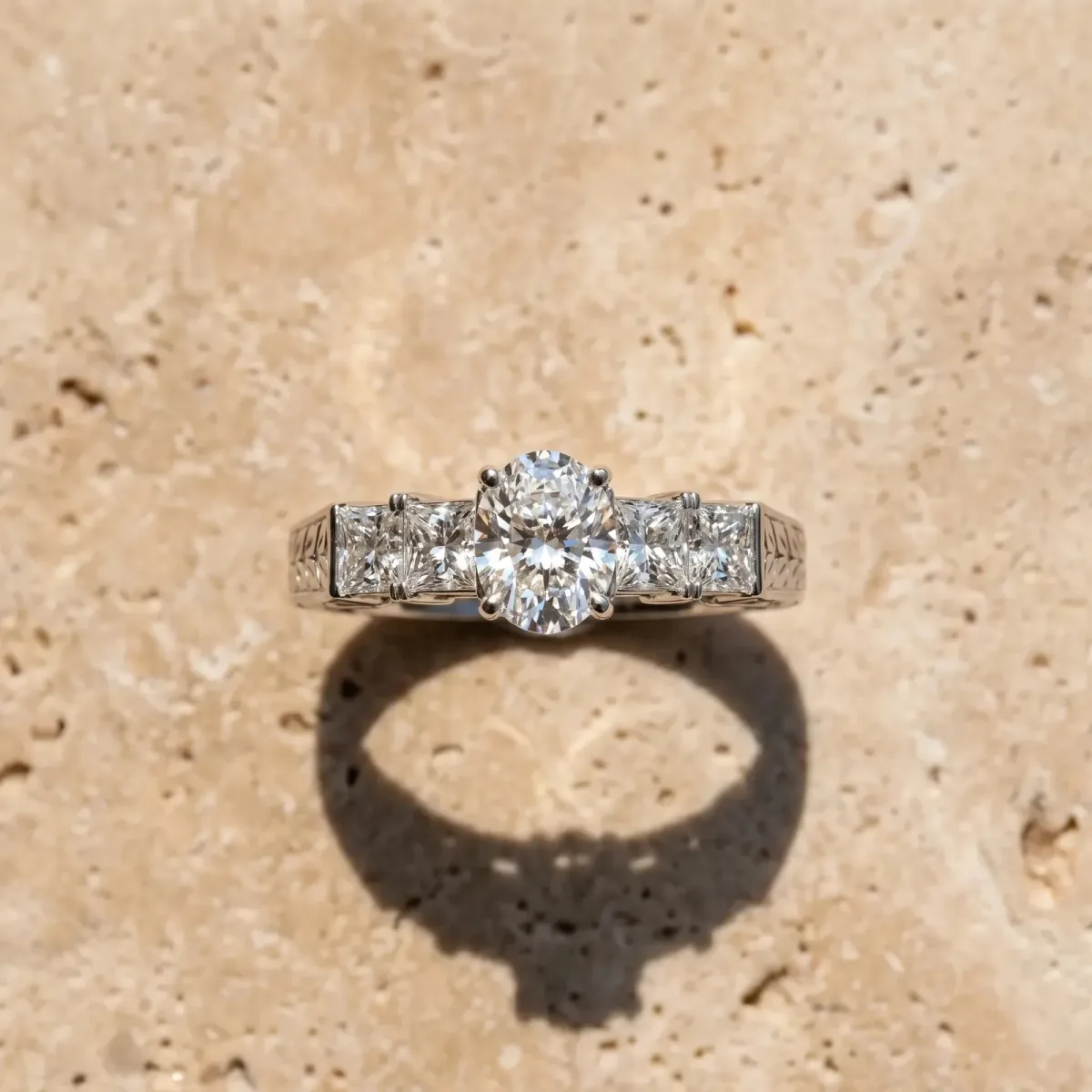 Oval Cut Solitaire Princess Side Stone Engraved Band Prong Setting Ring White gold