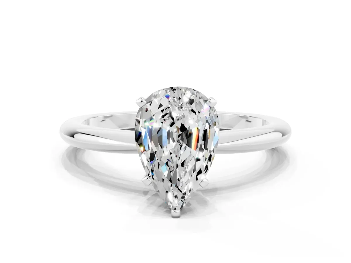Pear Cut Moissanite Solitaire Ring with Six-Prong Setting and Classic Band Silver