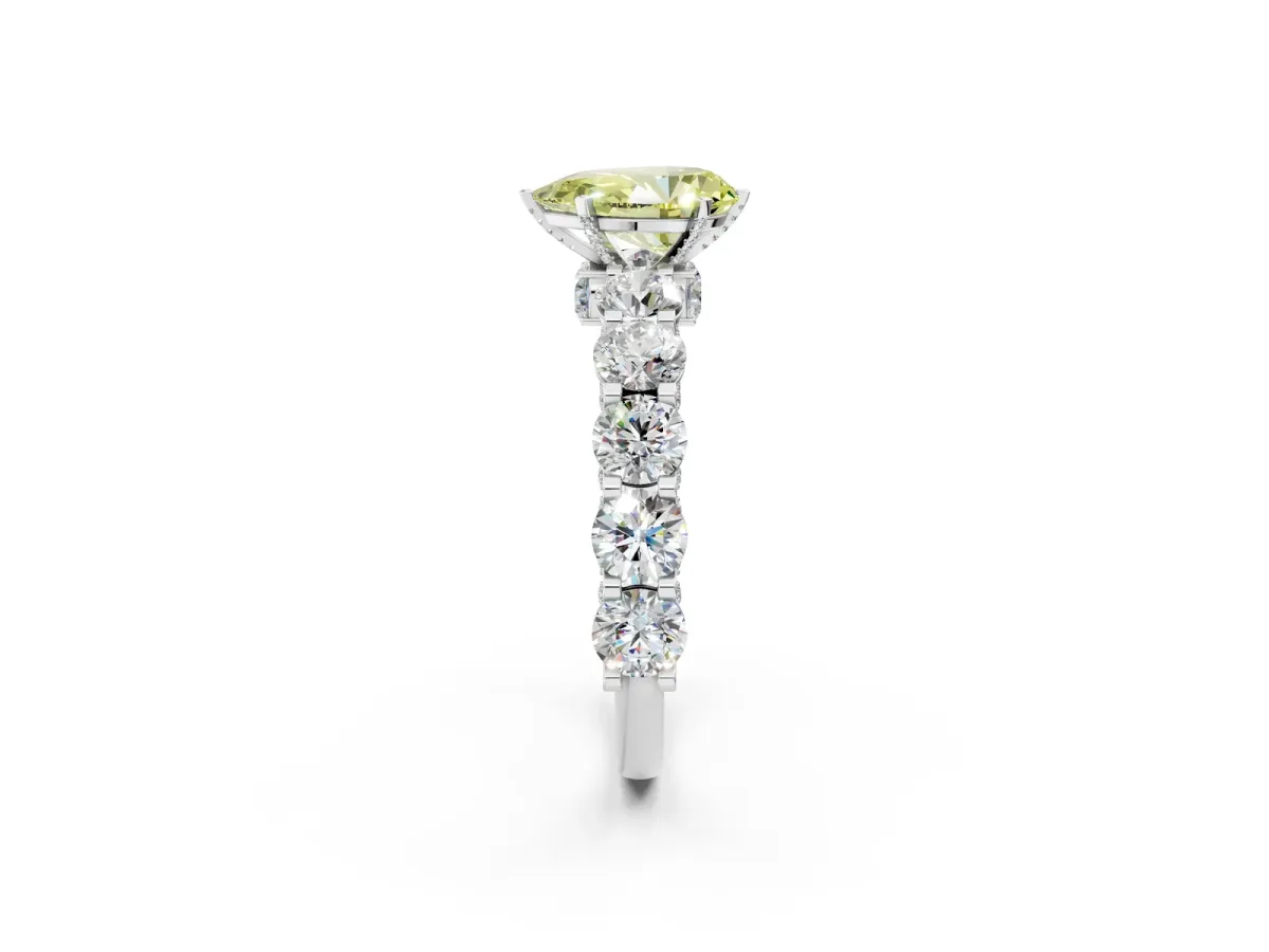 Fancy Yellow Pear Cut Diamond Side Stone Engagement Ring with Four-Prong Setting Platinum
