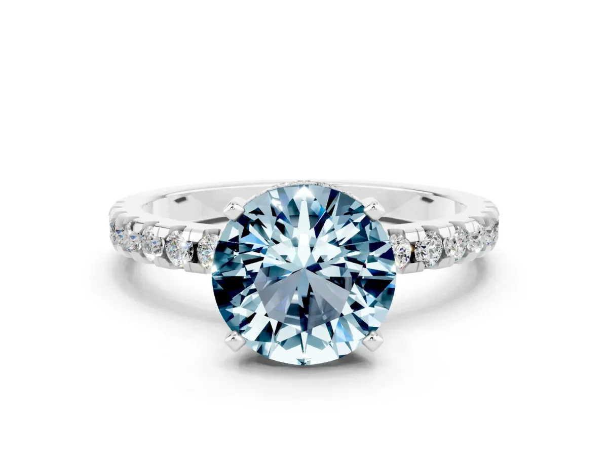 Round Cut Aquamarine Solitaire Ring with Round Pavé Band and Four-Prong Setting White gold