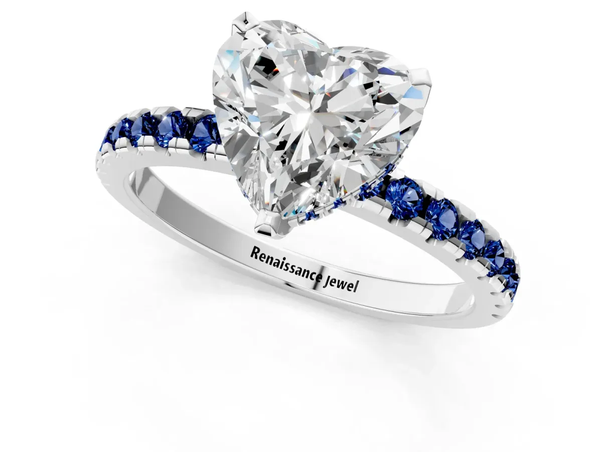 Heart Cut Diamond Solitaire Ring with Round Blue Sapphire Pavé Band and Four-Prong Setting White gold