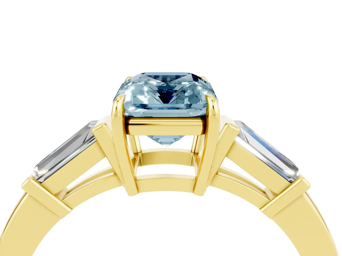 Emerald Cut Aquamarine Three-Stone Ring with Tapered Baguette Side Stones and Prong Setting Yellow gold