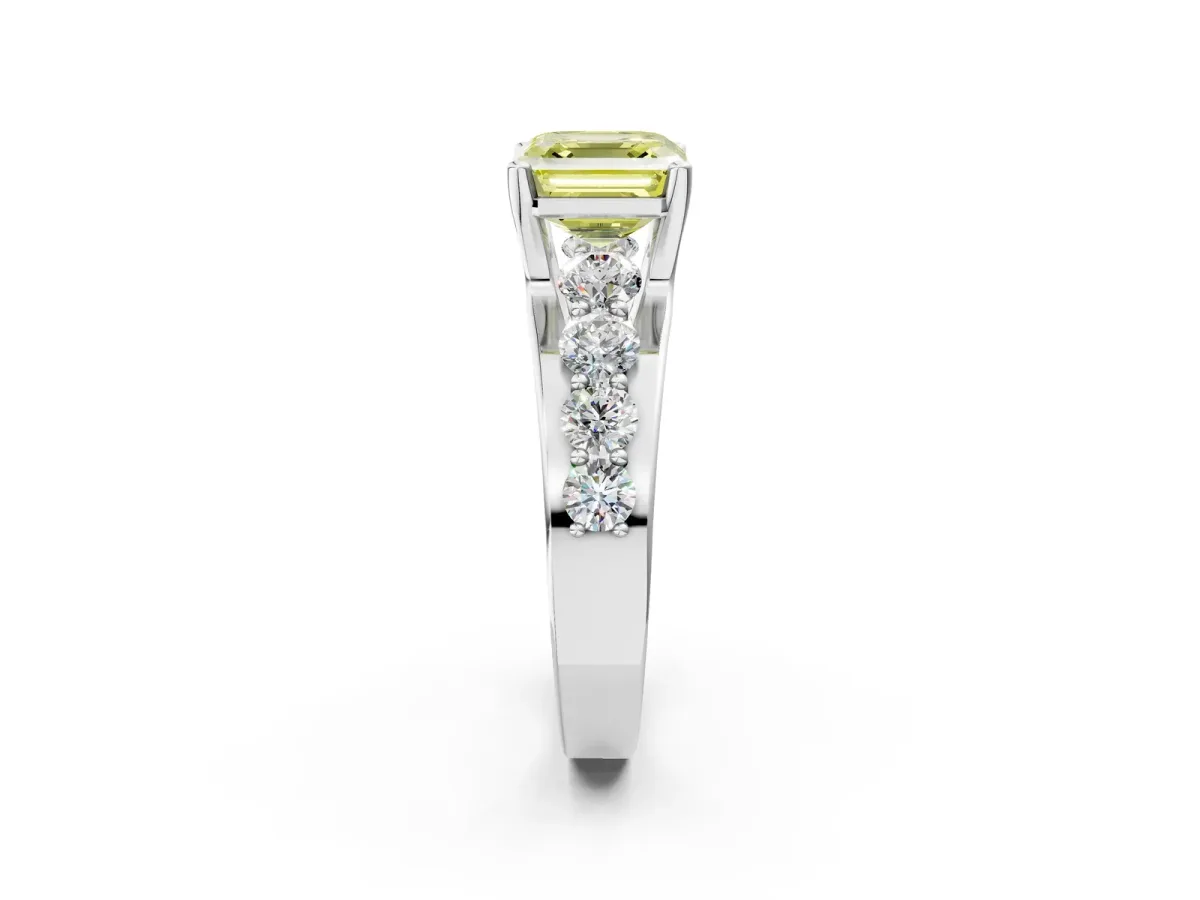 Fancy Yellow Asscher Cut Brilliant Solitaire with Side Stones on a Pave Band and Four-Prong Setting Platinum