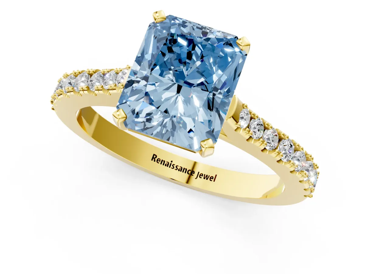 Fancy Blue Radiant Cut Cut Solitaire Diamond Engagement Ring with Pave Band and Four-Prong Setting Yellow gold