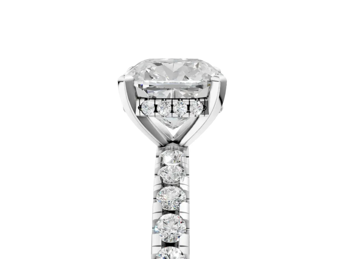 Cushion Cut Diamond Solitaire Ring with Round Moissanite Pavé Band and Four-Prong Setting White gold