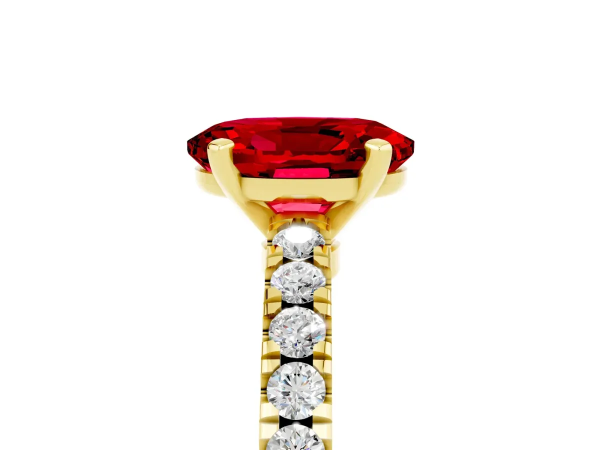 Oval Cut Solitaire Ruby with Pavé Band and Four-Prong Setting Yellow gold