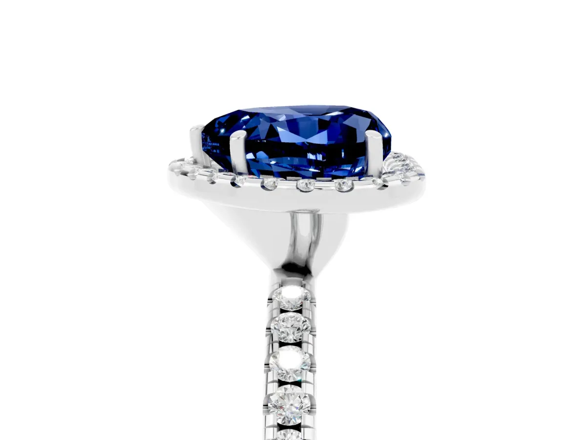 Heart Cut Blue Sapphire Halo Engagement Ring with Round Pavé Band and Prong Setting Platinum